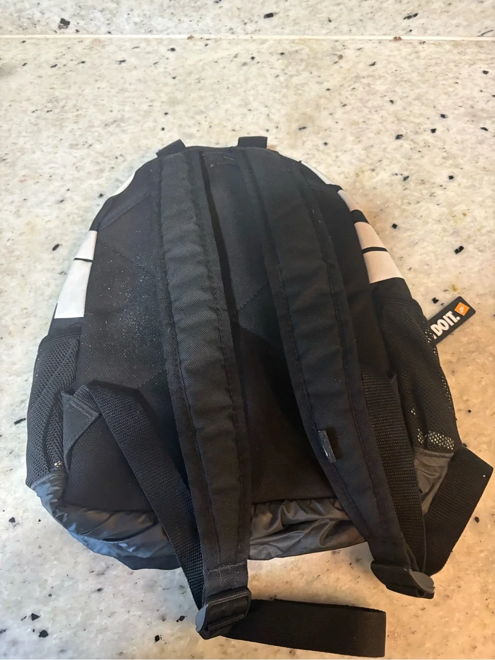 Nike Black and White Mini Backpack with Swoosh Accent